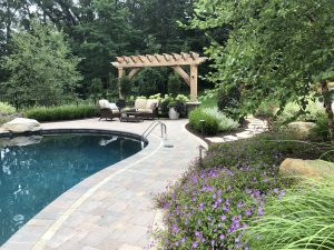 Landscaping with stone path and water feature